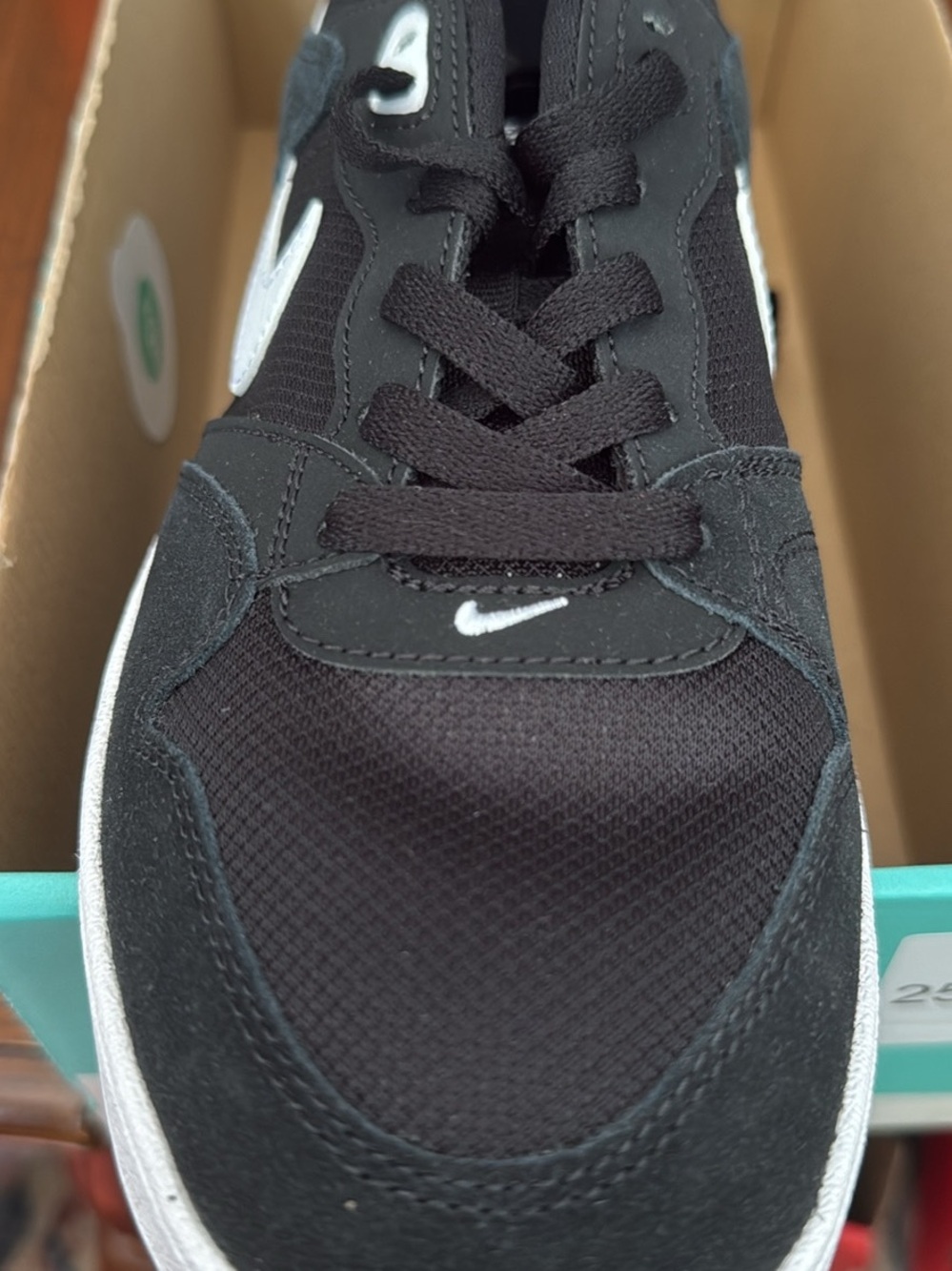 Nike Black and White Low-Top Sneaker with Mini Swoosh